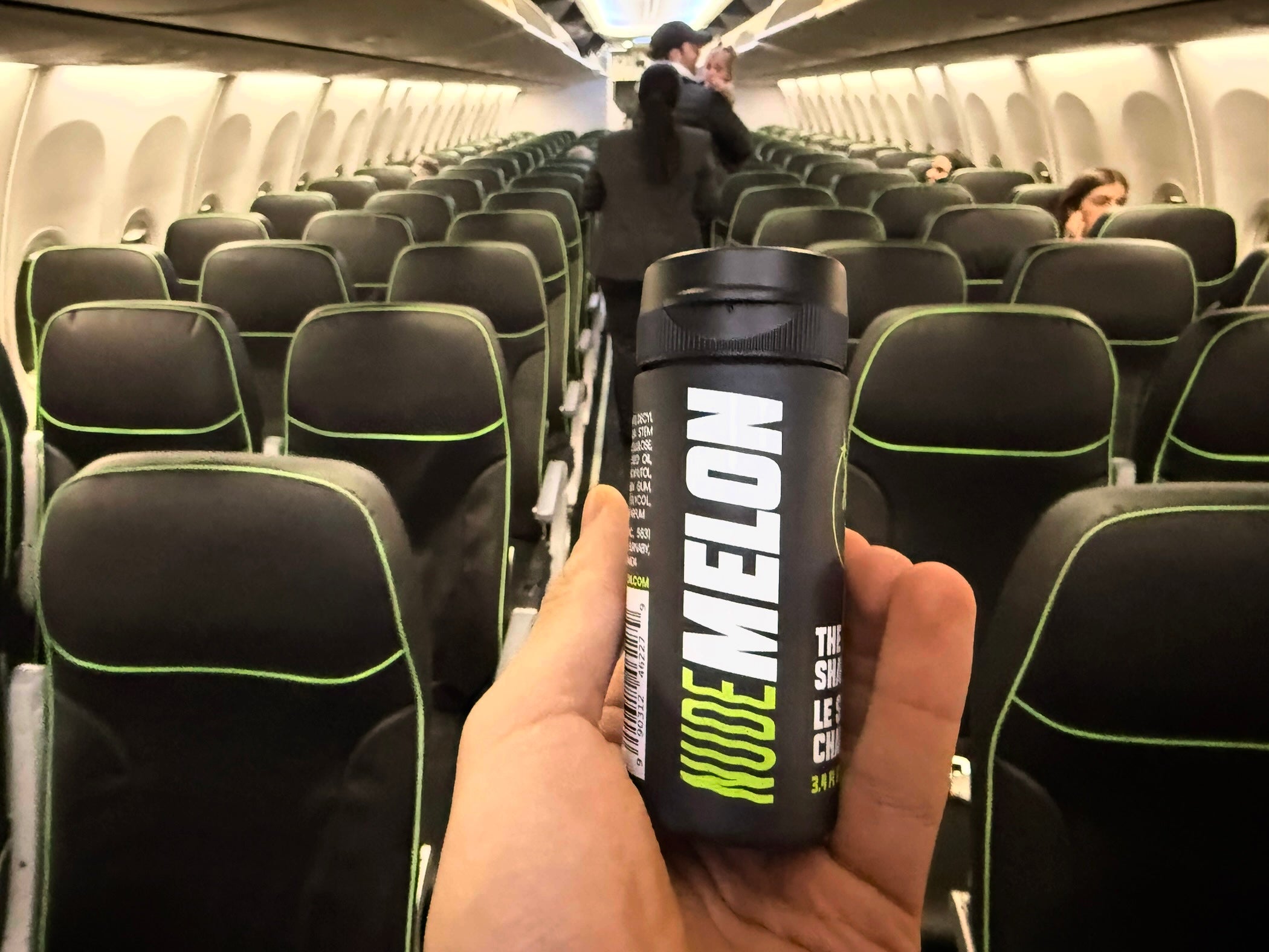 NUDEMELON Bottle on a Plane